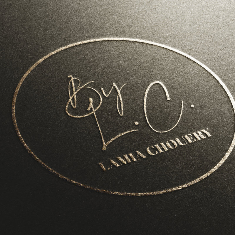Logo By L.C.